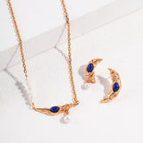 Natural pearl necklace with moon elements