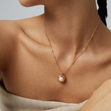 Natural pearl necklace with moon elements