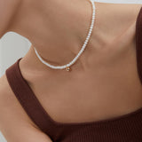 Small golden ball pearl necklace