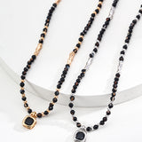 Adjustable Polished Black Onyx Ball Necklace in Sterling Silver